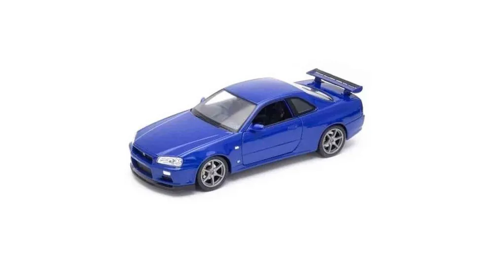 Nissan Skyline GT-R (R34) (1999) kék – 1 24 méretarányos fém modellautó és játékautó Welly Azonnali szállítás