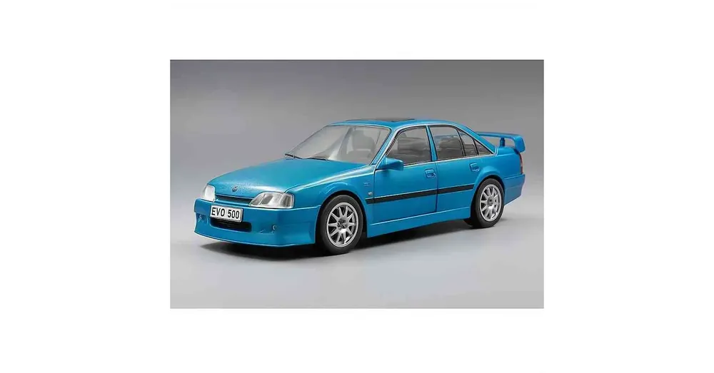 Opel Omega Evolution 500 (1991) kék – 1 24 méretarányos fém modellautó Whitebox Outlet